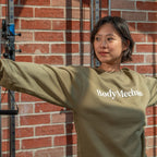 Comfortable green sweatshirt for physiotherapists and rehab professionals from Cardon Rehab’s Body Mechanic collection.